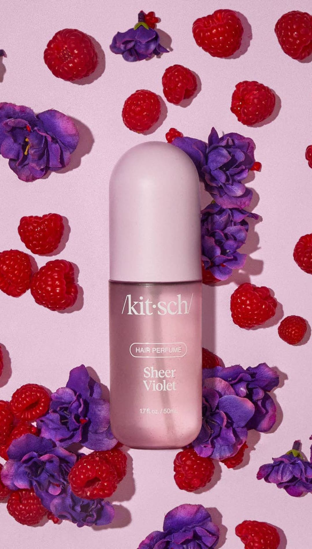 Pink and white nail polish bottle with floral design, kitsch brand.