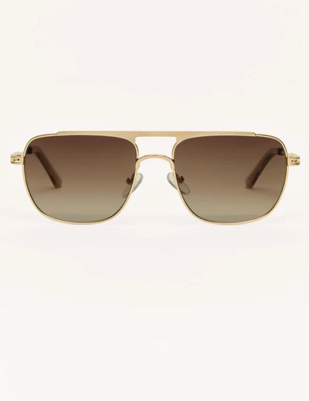 Gold-framed aviator sunglasses with brown gradient lenses.