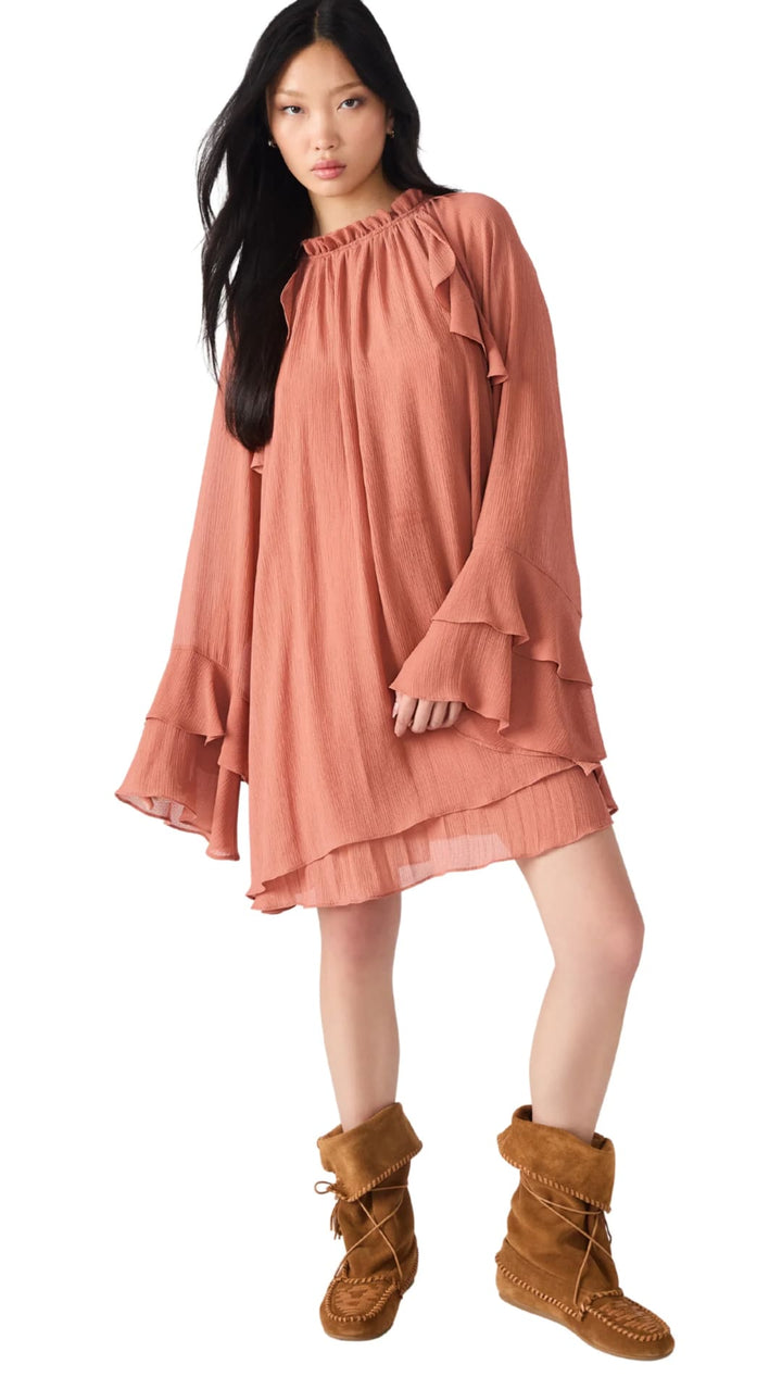 Rust-colored ruffled mini dress with wide, tiered sleeves and a high neckline.