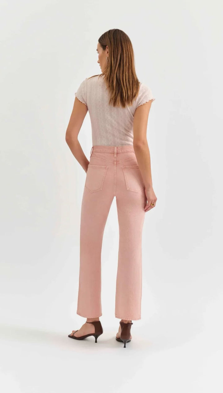 Woman wearing pink pants.