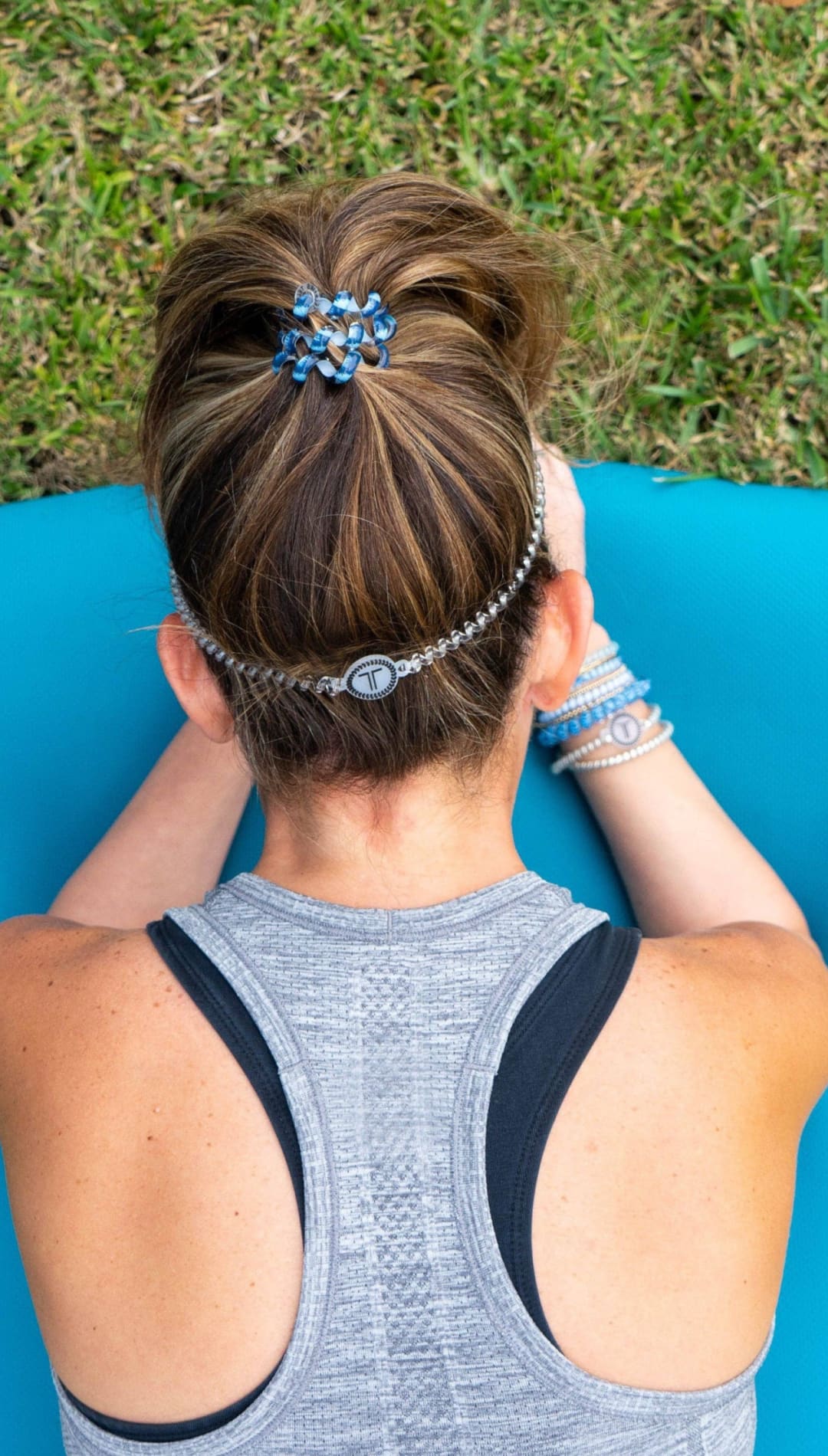 Blue yoga mat with textured surface and foam core design, suitable for outdoor use.