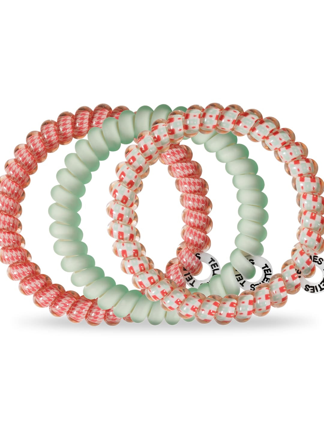 Coral and mint green braided hair ties set with white text.