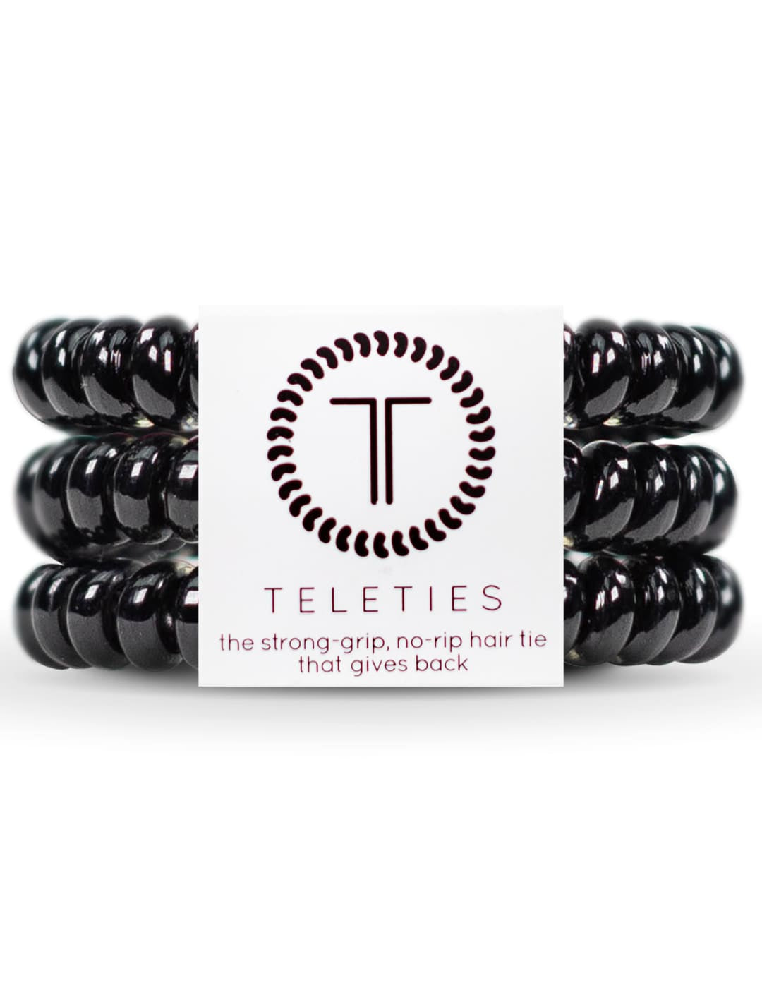 Black spiral hair ties with a circular logo featuring the letters ’tt’ in white and dark gray.