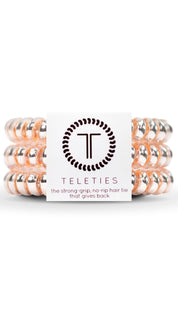 Rose gold and silver beaded hair ties from teleties, strong grip no rip design.