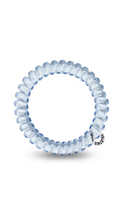 Silver spiral hair tie with a small logo on the side.