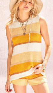 A cozy, sleeveless knit top with horizontal stripes in cream and mustard yellow.