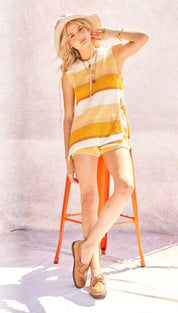 Yellow and white striped knit sleeveless dress with matching shorts.