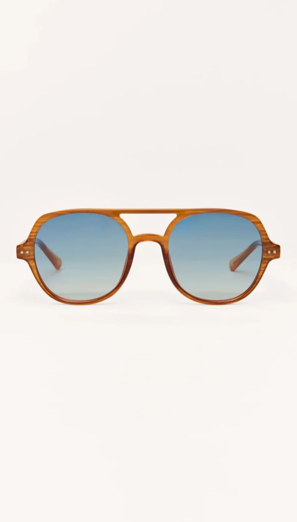 Aviator sunglasses with tortoiseshell frame and gradient blue lenses.