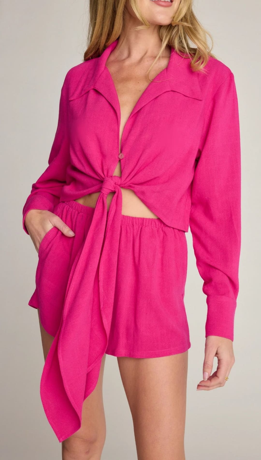 Hot pink tie-front shirt and shorts set.