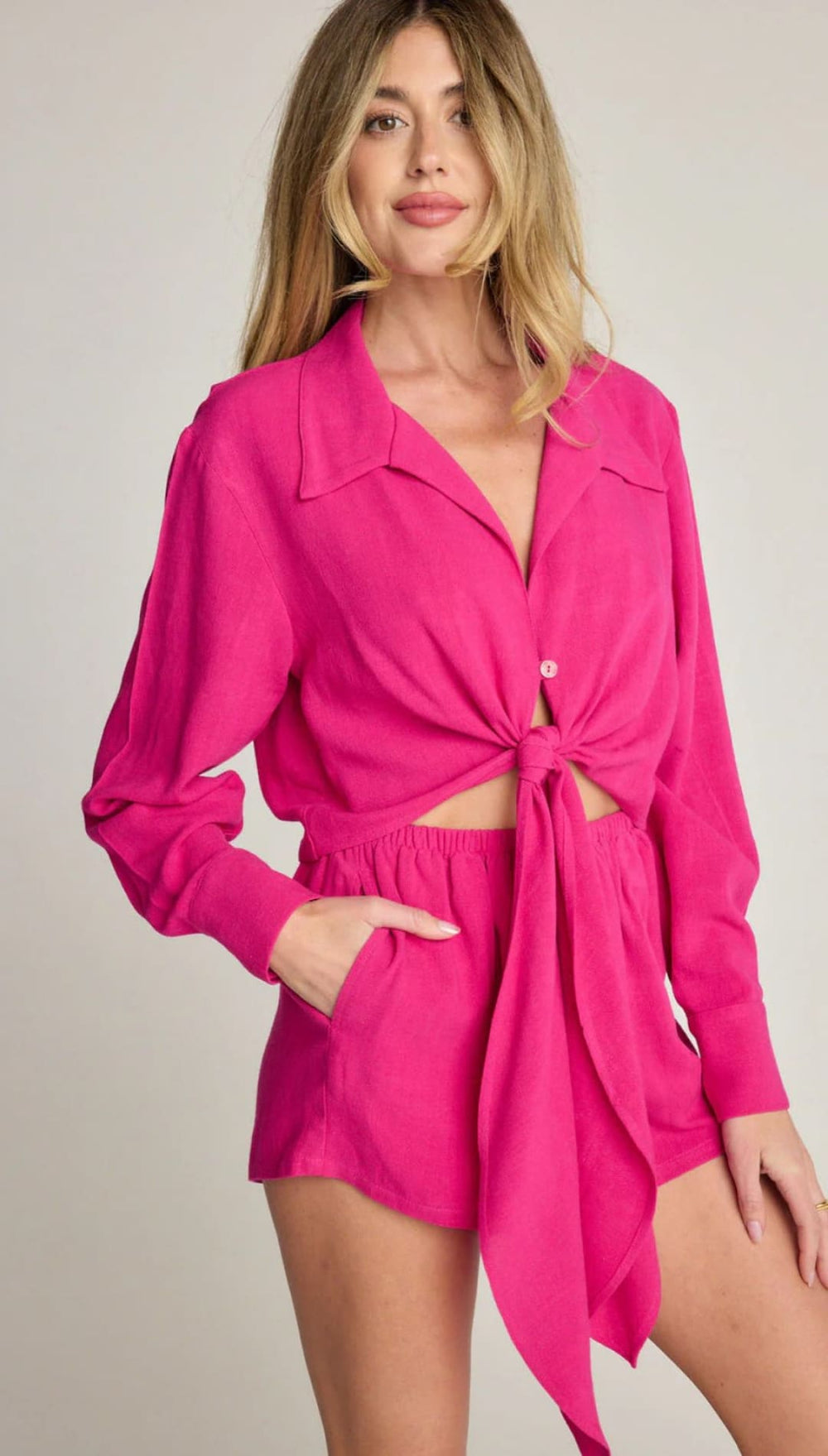 Hot pink tie-front shirt and shorts set.