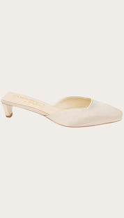 Cream-colored heeled mule.