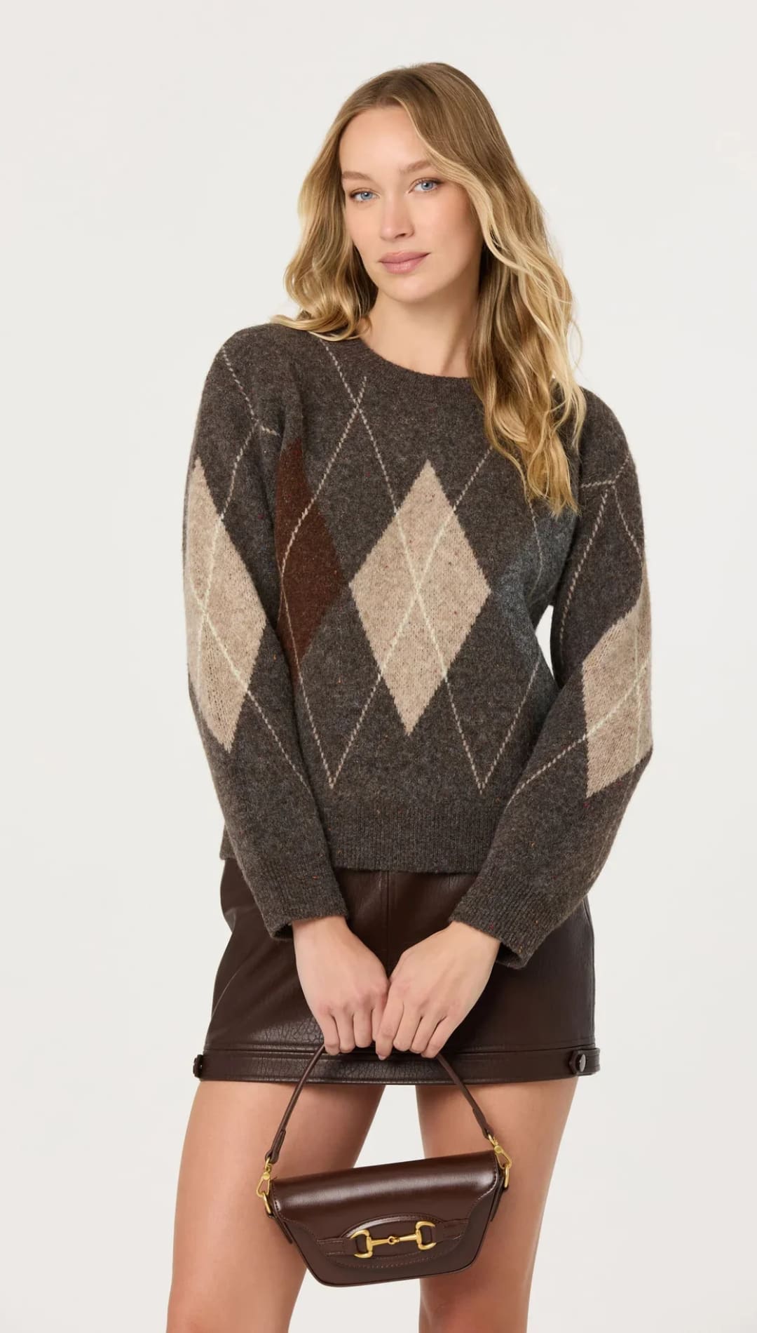 Brown argyle knit sweater with a textured, wool-like fabric and contrasting beige and dark brown diamond patterns.