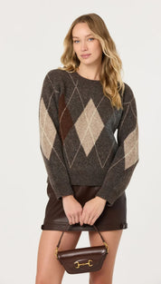 Brown argyle knit sweater with a textured, wool-like fabric and contrasting beige and dark brown diamond patterns.