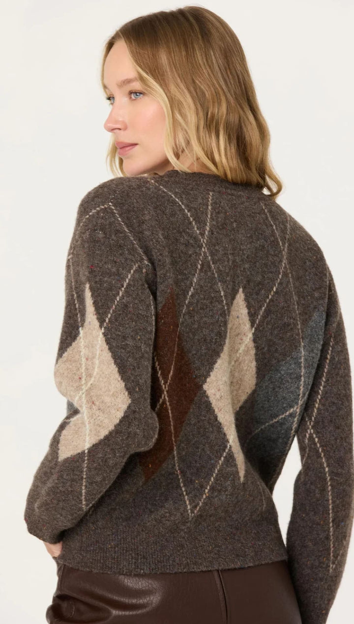 A cozy brown argyle knit sweater with a textured, heathered base and geometric diamond patterns in beige and muted blue.