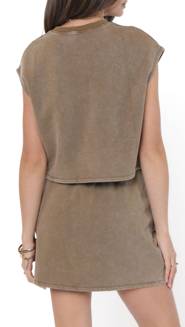 Women’s olive green two-piece skirt set with a cropped top and mini skirt.