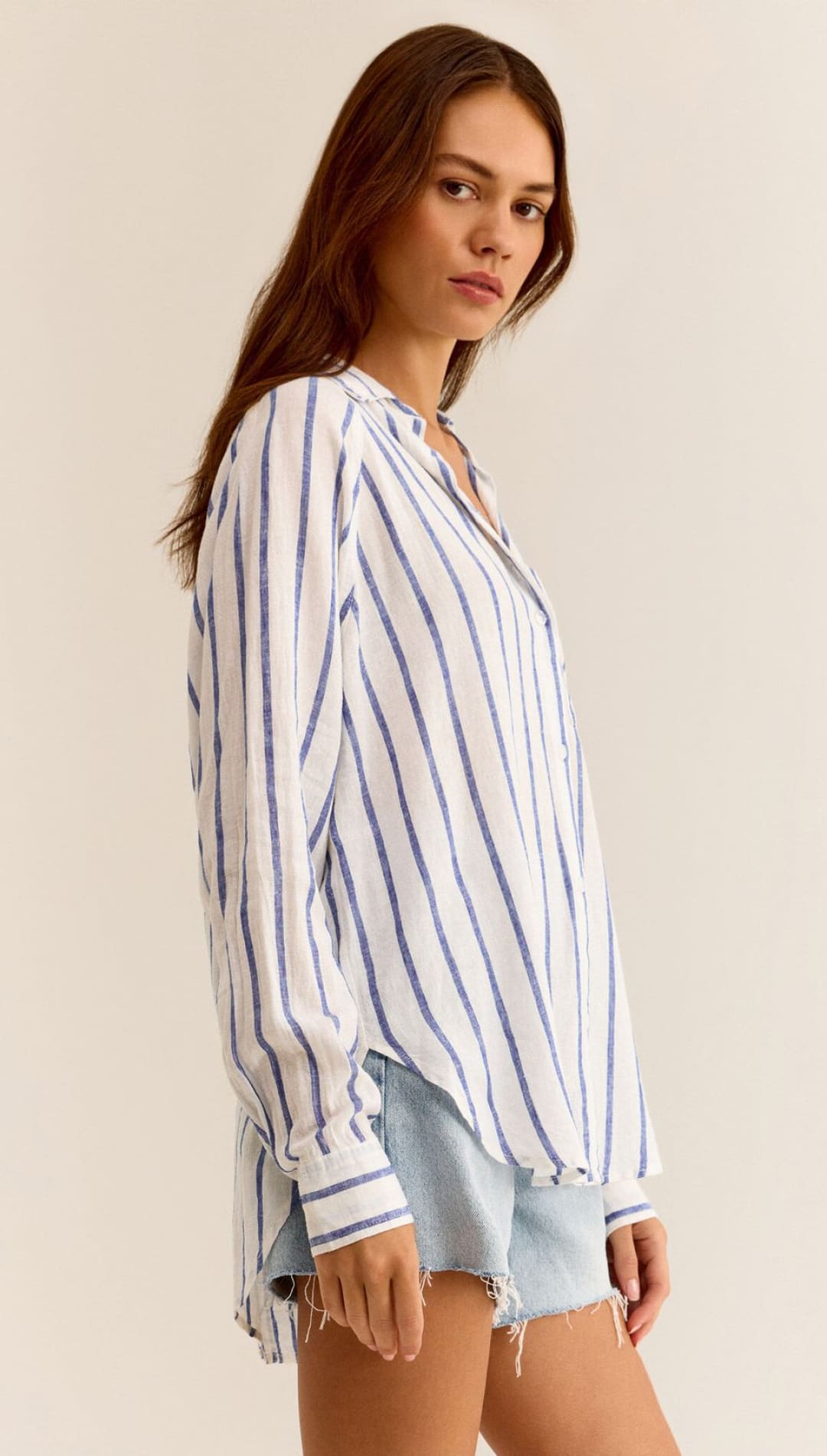 Striped long-sleeved blouse.