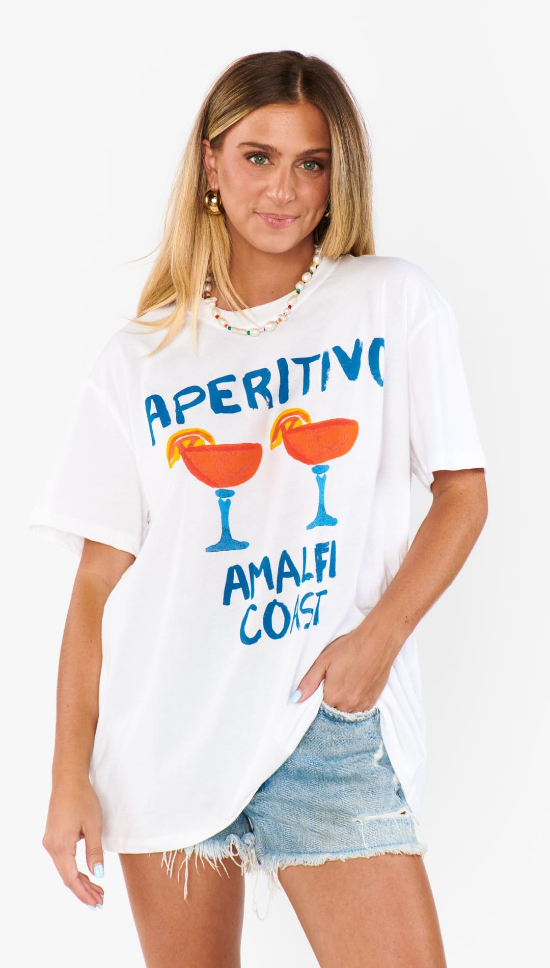 White t-shirt with cocktail graphic.