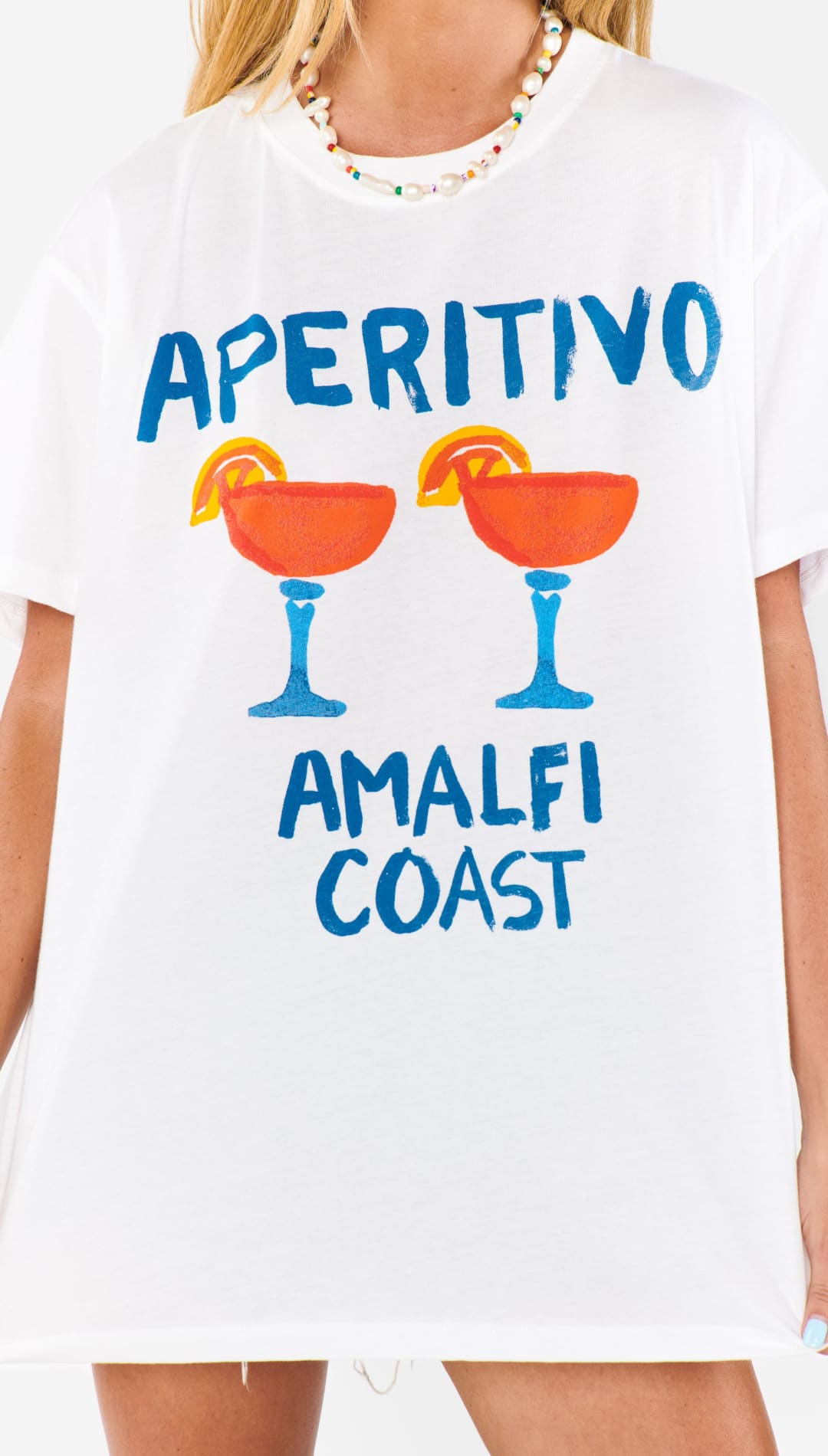 White t-shirt with cocktail graphic.