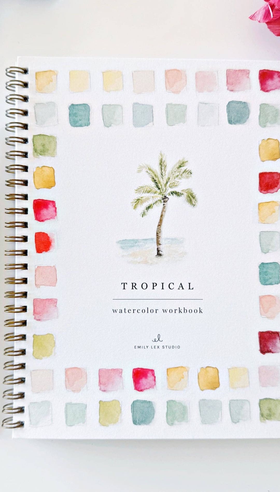 Watercolor workbook with tropical palm tree design, spiral binding, and pastel color palette.