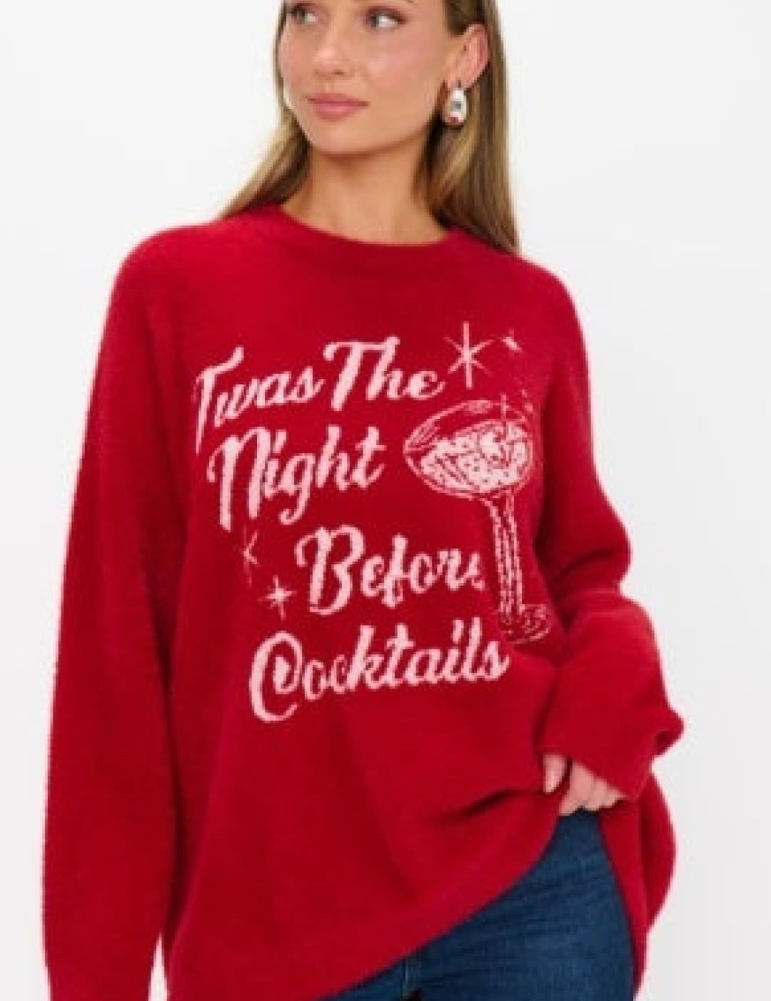 Red oversized sweater with ’twas the night before cocktails’ design and bell sleeves.