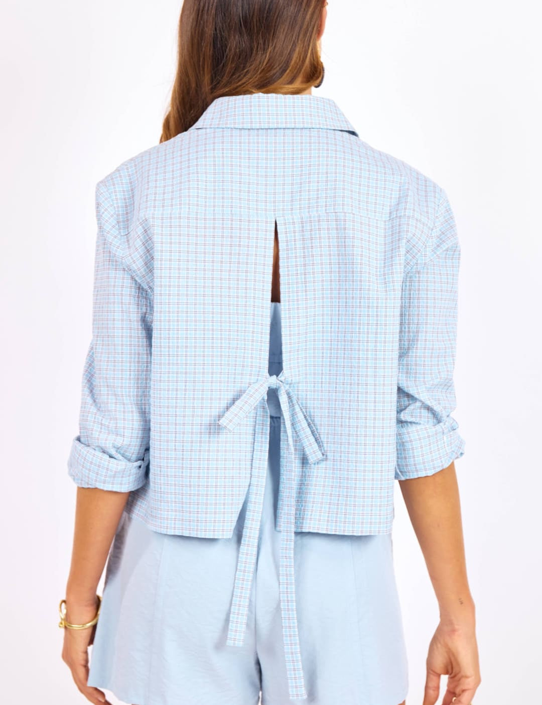 Light blue checkered blazer with a back tie detail.