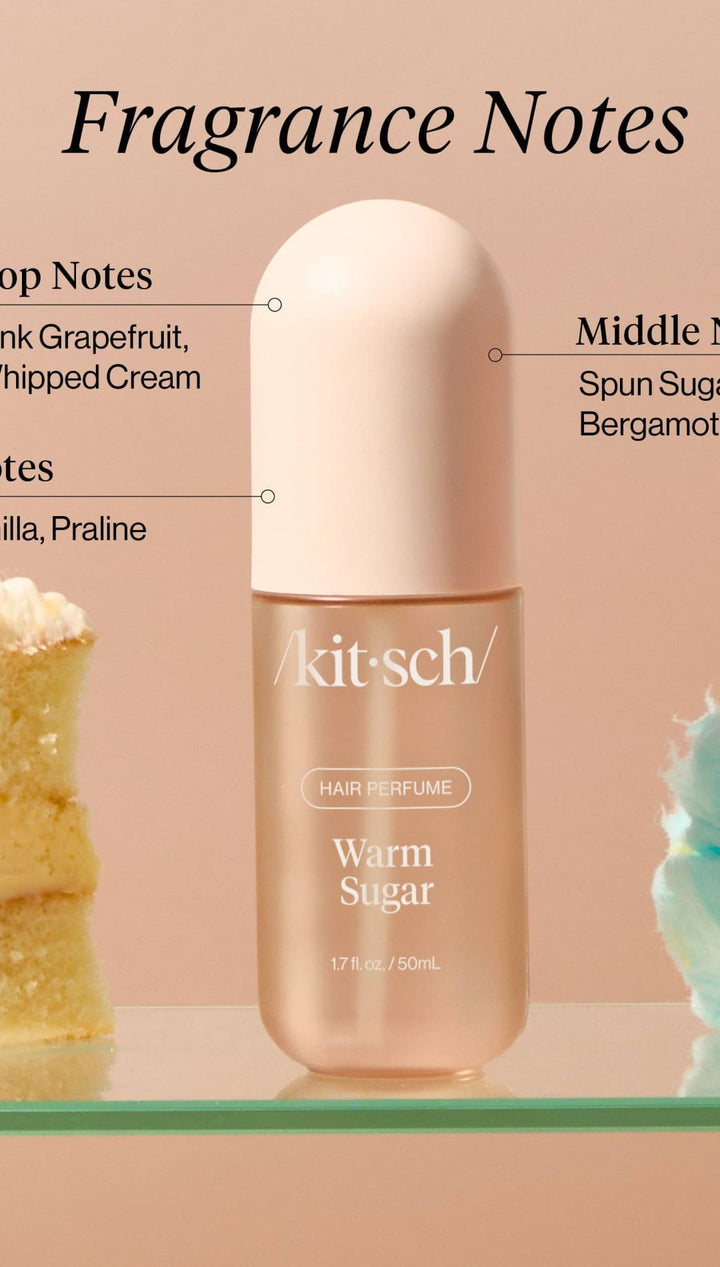 Gold perfume bottle with ’warm sugar’ label and floral design.