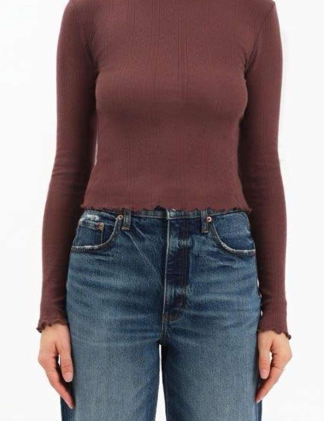 Burgundy ribbed knit sweater with high neckline and long sleeves.