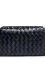 Black bottega veneta woven leather toiletry bag with zipper closure.