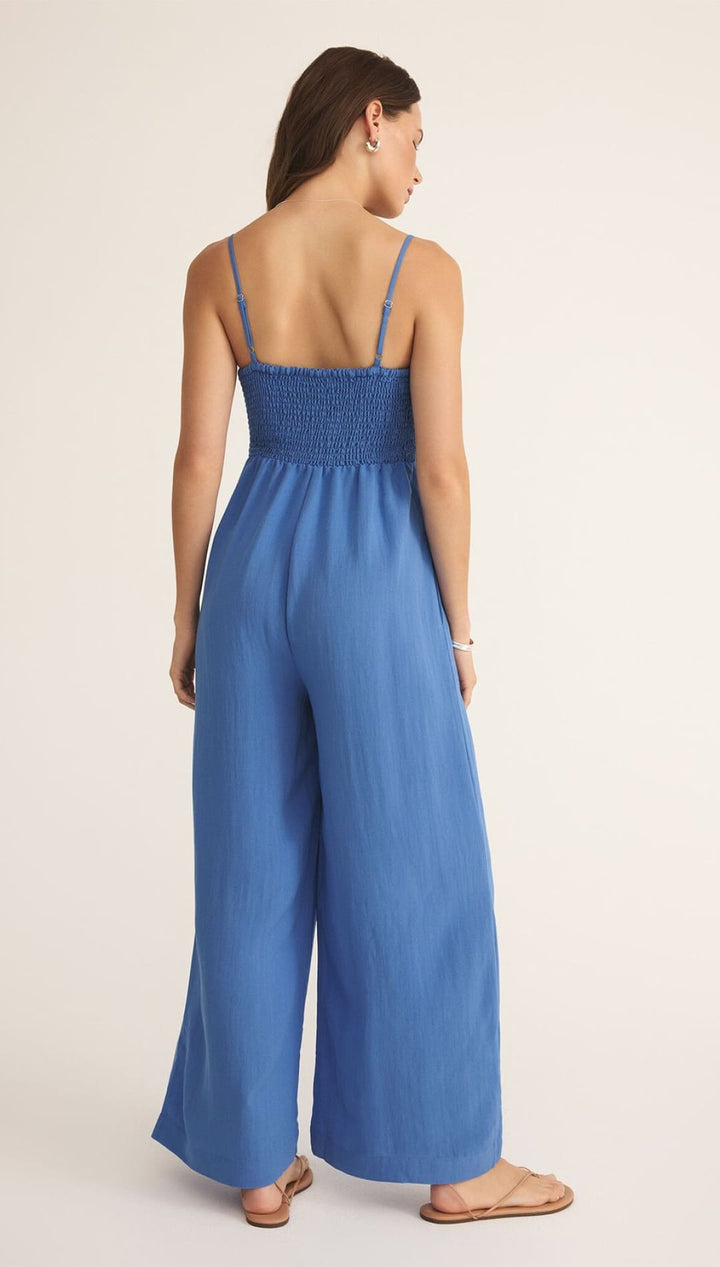 Blue wide-leg jumpsuit.