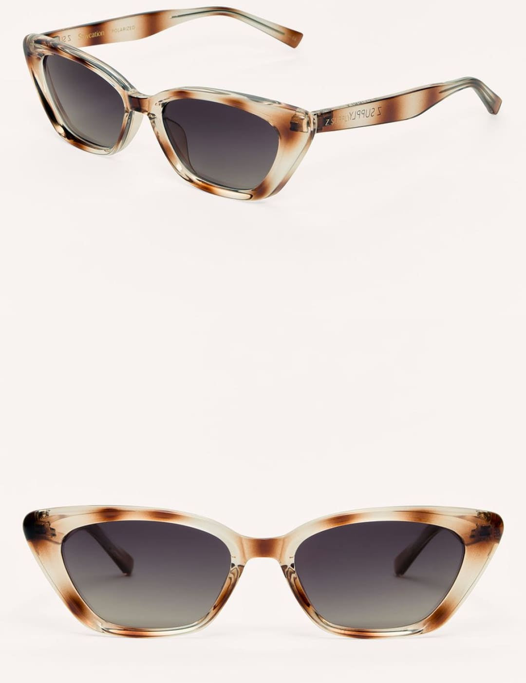 Cat-eye sunglasses with a translucent, light brown tortoise shell pattern and dark gradient lenses.