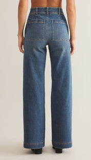 Women’s high-waisted, wide-leg blue jeans with back pockets.
