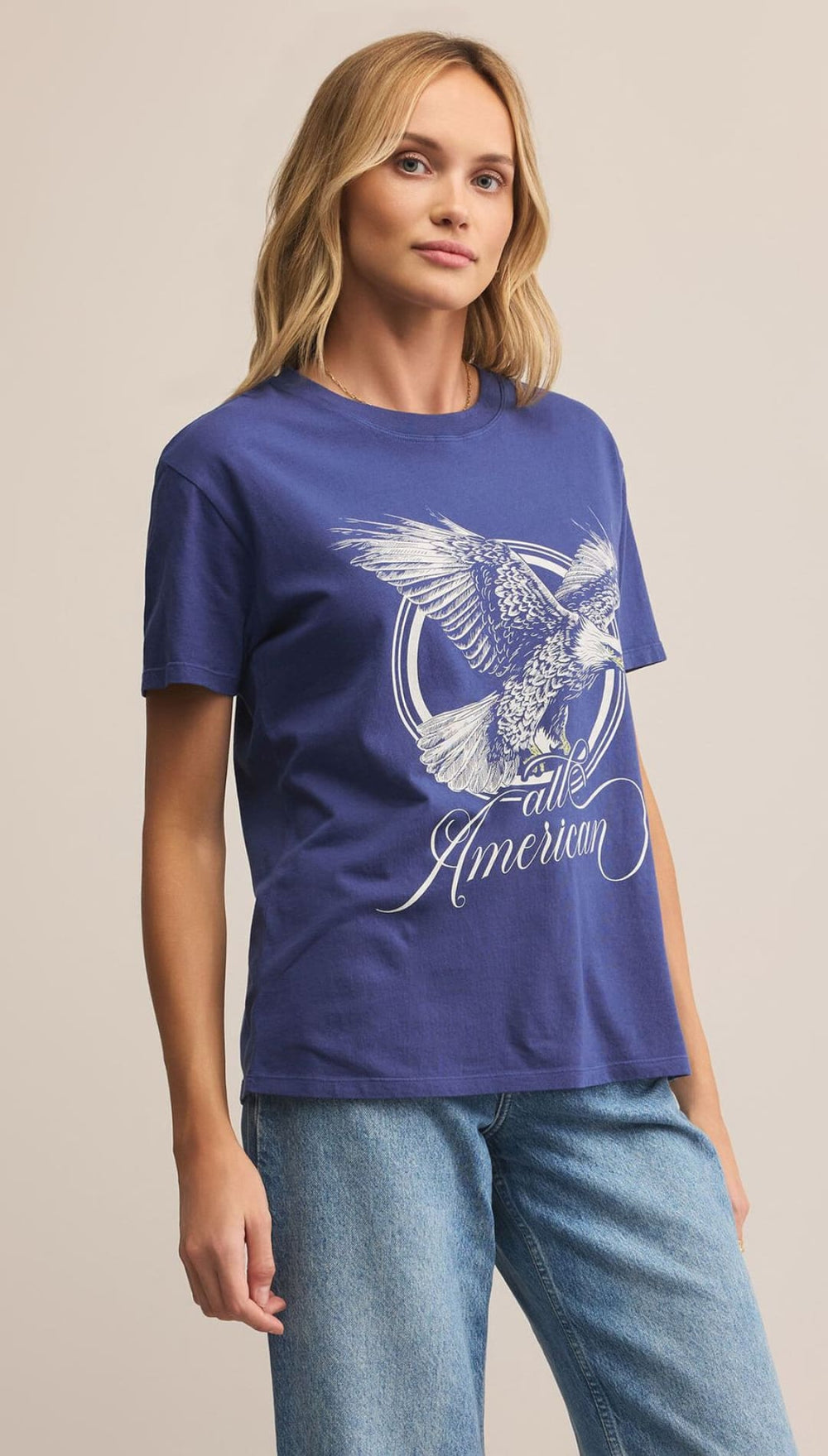 Women’s short-sleeved blue t-shirt with an eagle graphic and ’all American’ text.