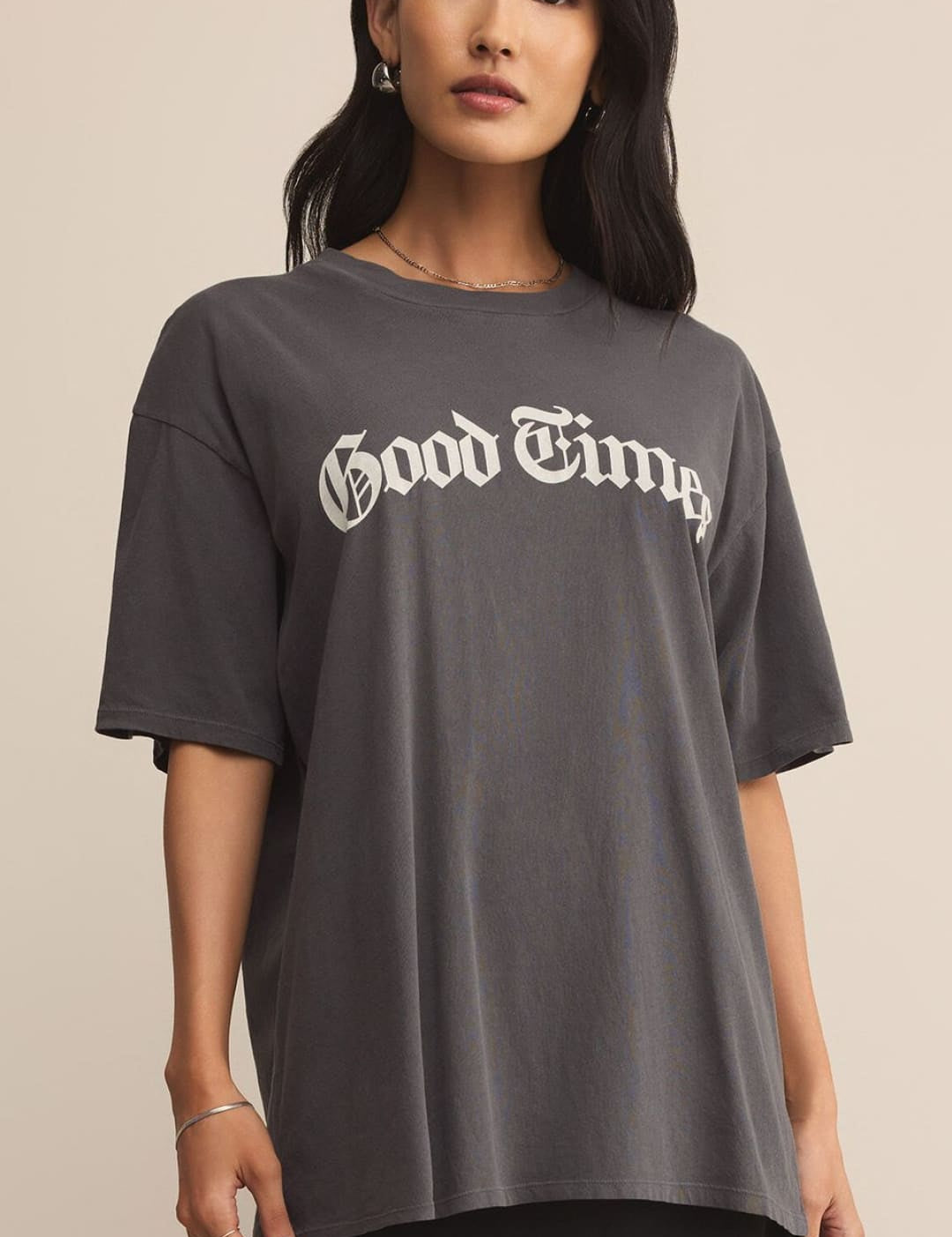 Charcoal gray oversized t-shirt with ’Good Times’ in white script.