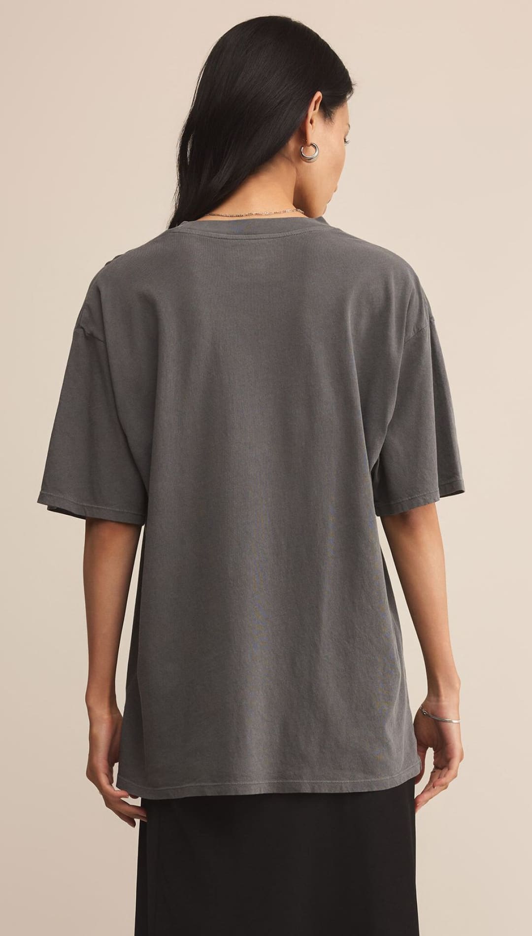 An oversized charcoal gray t-shirt with short sleeves and a crew neck.