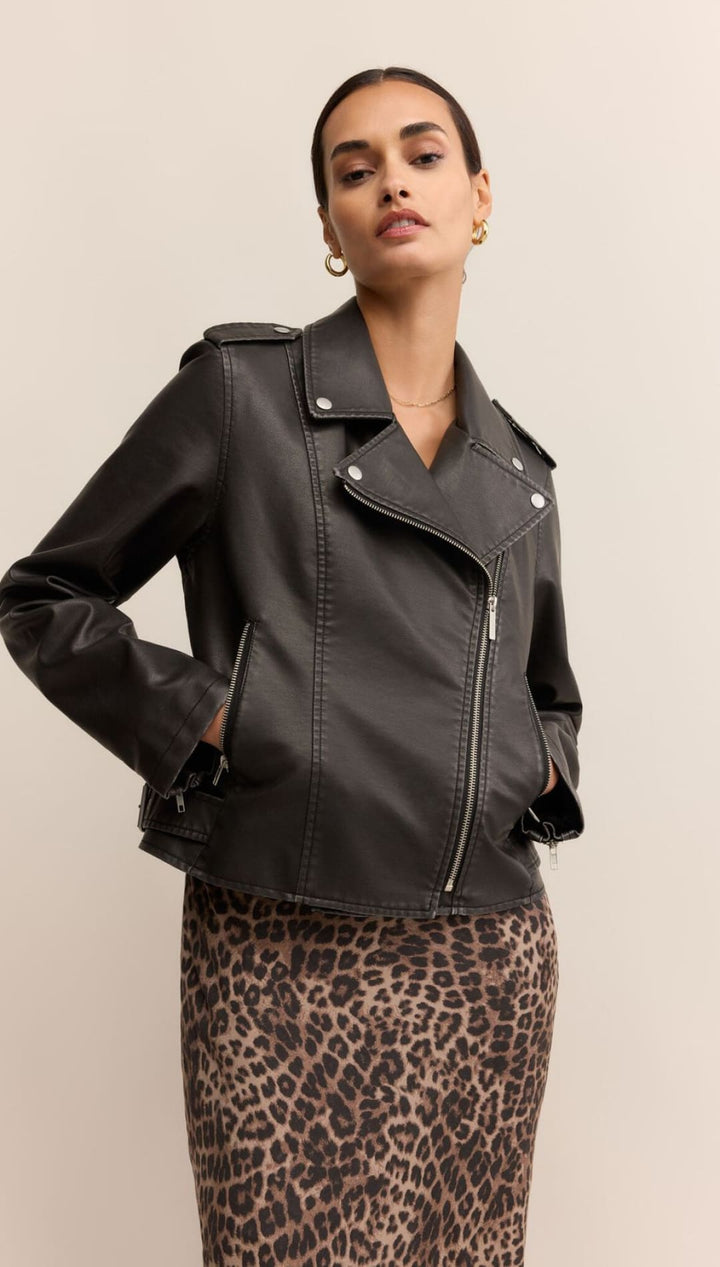 Black faux leather moto jacket with silver hardware and zipper details.