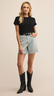 Light wash denim shorts with a frayed hem.