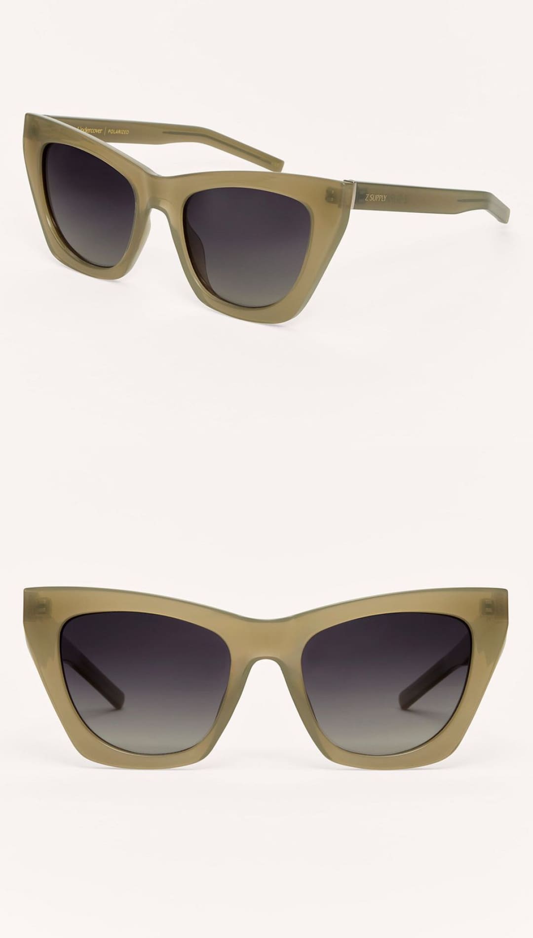 Olive green translucent cat-eye sunglasses with dark gradient lenses.